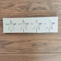 Detail view of 4-cavity star-shaped silicone lollipop mold for fondant and chocolate - 4-Cavity Star