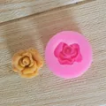Detail view of pink rose silicone mold with finished yellow flower carving detail - Rose / Flower / Pink