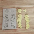 Detail view of Baroque relief silicone mold with finished resin or fondant pieces - Style 4 (Retro Border) / 4