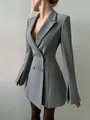 Side view detail of a tailored grey double-breasted blazer dress with split sleeves. - S / Dresses / Gray