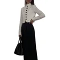 Elegant white cropped blazer featuring a mandarin collar and decorative black buttons for women - S / Tops / White