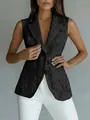 Close-up of a black sleeveless lace blazer vest featuring a sharp lapel and floral texture - S / Tops / Black