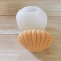 Vue détaillée moule silicone coquillage avec bougie savon finie en forme de mer. - Petit Coquillage