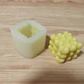 Detailed macro view of a 3D heart cube silicone mold and its finished yellow candle. - Small Heart Pendant