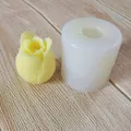 Detailed view of tulip flower silicone mold with finished yellow candle on textured background - Small Tulip