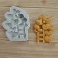 Detail of heart-shaped balloon and bear silicone mold for Valentine's Day baking. - Ladder LOVE