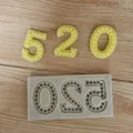 Macro detail showing textured pearl pattern 520 silicone mold for DIY cake decoration - 520 Number Shape / 520