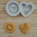 Detail view of heart silicone mold and finished clay hearts with 'Love you' text. - Round Heart LOVE