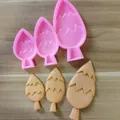 Detail view of tree-shaped silicone mold showing three sizes and resulting molded shapes. - 3-Cavity Bar