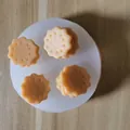 Detail view of silicone mold showing four realistic scalloped sandwich cookies. - 2# (4-Hole Wave Round)
