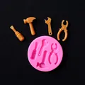 Detail view of pink silicone mold with tool shapes for cake and chocolate decoration - Simulation Tool Modeling / Pink