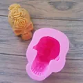 Macro view of pink silicone skull mold with intricate rose details for DIY crafts - Skull with Flowers / Pink