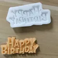 Silicone mold for Happy Birthday cake toppers showing the mold and finished fondant piece - S
