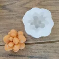 Detailed view showing the white silicone succulent mold and an orange wax finished product. - Succulent Cluster Style (6#) / Size 6