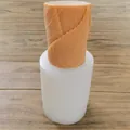 Detail view of cylindrical candle mold with realistic leaf texture on wooden background - Leaf Shaped Mold / 7x8cm