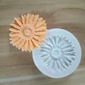 Macro view of a chrysanthemum silicone mold featuring an orange fondant flower sample. - Daisy Style 2 (Single Cavity) / 3.5cm x 0.8cm