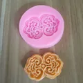 Traditional Chinese scroll cloud pattern silicone mold shown with finished fondant piece - As You Wish