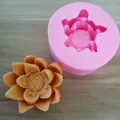 Close-up detail of a pink silicone lotus mold with a finished brownish aroma wax flower - No. 2 (Lotus Style)