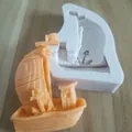 Detail view of a nautical pirate ship silicone mold showing the orange fondant output. - Classical Large Ship (4#) / 4#