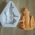 Detail showing nautical lighthouse silicone mold and finished orange fondant piece - Size 6