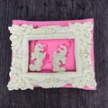 Detail of pink silicone mold with vintage embossed frame and leaf pattern plaster shapes - Vintage Photo Frame Style (2457) / Pink