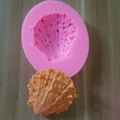 Close-up view of pink silicone seashell mold and finished orange fondant craft details. - Style 1