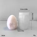 Vue détaillée du moule en silicone en forme d'œuf avec mesures en centimètres et en pouces - 0933