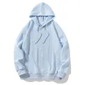 Detailed view of light blue men's hoodie with textured jacquard cable knit pattern - XS / Tops / Sky Blue