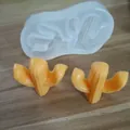 Detailed view of a 2-cavity cactus silicone mold alongside finished orange cactus ornaments - 2-Cavity Cactus / 85x52mm