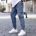 Stylish blue cargo joggers featuring drawstring waist and large side pockets for men. - S / Bottoms / Blue
