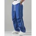 Men's retro techwear blue track pants with white side stripes and drawstring waist - S / Bottoms / Blue