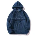 Plush blue men's fleece hoodie featuring half-zip drawstring and MUSCLE TACK embroidery - S / Tops / Navy Blue