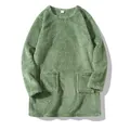 Close-up detail of a soft mint green fuzzy plush sweatshirt featuring two front pockets. - XS / Tops / Light Green