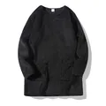Cozy women's black fuzzy sweatshirt featuring front pockets and soft plush fleece texture. - XS / Tops / Black