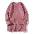 Close-up showing the soft plush texture of the pink round-neck long-sleeve sweatshirt. - Pink