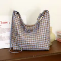 Blue and brown gingham shoulder bag featuring delicate white floral embroidery patterns - Coffee Blue Small Plaid