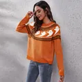 Womens casual orange Halloween ghost knit sweater featuring vintage polka dot patterns - S / Tops / Orange
