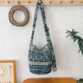 Plush crossbody bag with blue and white Fair Isle pattern and adjustable shoulder strap. - Adjustable Length / Cyan Ethnic Stripe