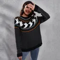Detail of Halloween ghost pattern on vintage black polka dot knit sweater for women - S / Tops / Black