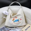 Stylish off-white crossbody bag featuring cute dachshund embroidery and cloud charm - Bag With Cloud Pendant / White