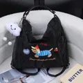 Niche Harajuku black nylon crossbody bag with dachshund embroidery and cloud charm - Bag With Cloud Pendant / Black