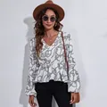 Stylish V-neck chiffon blouse with black rope print and elegant lantern sleeves - S / Tops / Chain