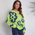 Women's oversized knit sweater with navy blue floral jacquard in vibrant lime green - S / Tops / Green