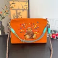 Japanese style orange waterproof crossbody bag with an embroidered sequin bear design motif - Musical Bear / Waterproof Nylon (Includes 2 Straps) / Orange