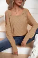 A detailed view of a women's camel cold-shoulder cable knit sweater with buttons - Khaki