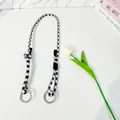 Stijlvolle zwart-wit geweven koordband met pied-de-poule patroon en metalen ringen - Universele Riem / Grijs/Wit