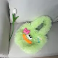 Cute green furry tote bag with cartoon face and pink bow detail - Green