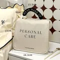 Elegante beige wasserdichte Make-up Tasche mit Perlengriff und Größenabmessungen - 24.3x23x9cm / Weiß