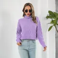 Detail view showing the cable knit texture of a purple turtleneck cropped sweater for women - S / Tops / Violet