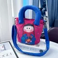 Original cute hand-painted girl canvas bucket bag with blue shoulder straps and handles - Girl Holding Chicken Style (02) / Pink and Royal Blue Contrast